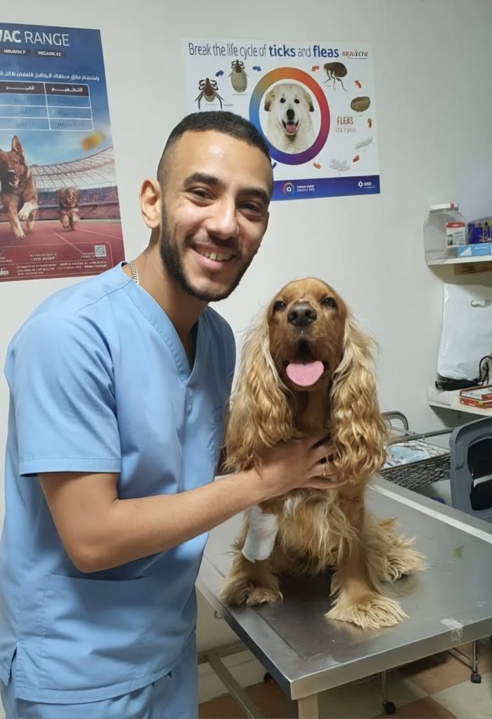 Dr George Henien with dog at Mont Albert Vet